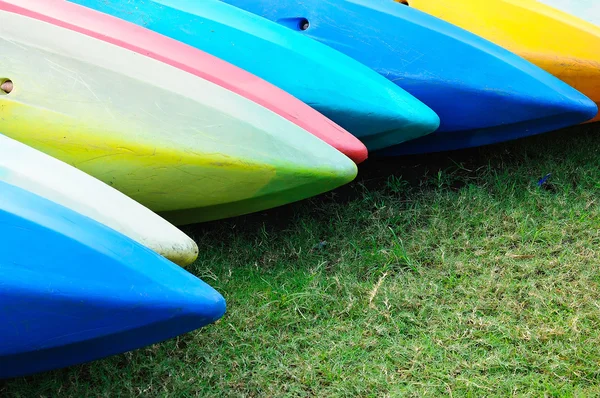 Colorful kayaks in stack — Stock Photo, Image