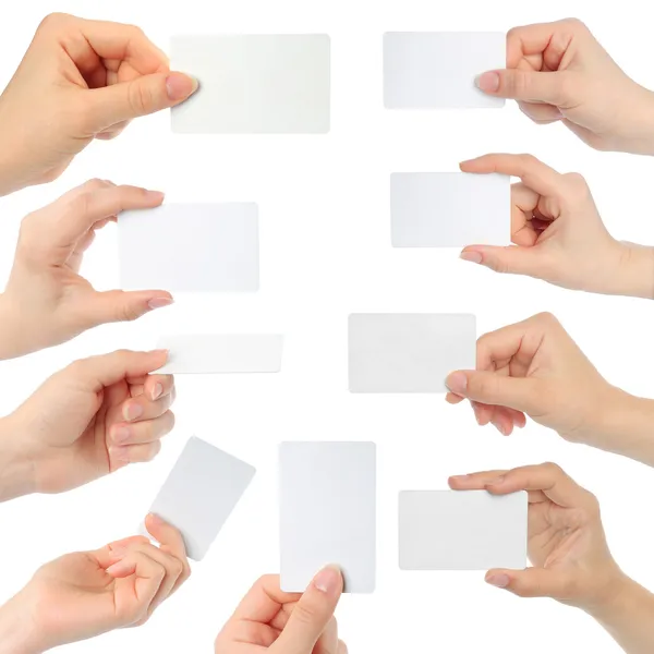 Руки держат визитки — стоковое фото
