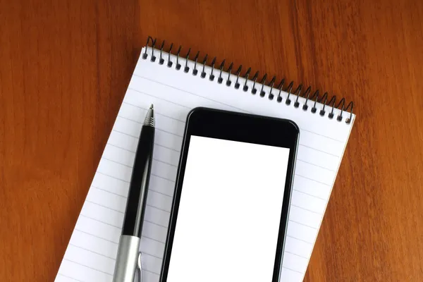 Smart phone, pen and notepad — Stock Photo, Image