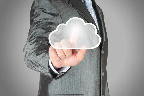 Geschäftsmann drückt virtuelle Cloud-Taste Stockbild