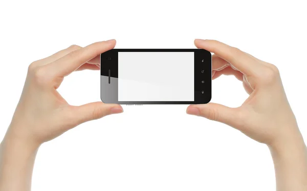 Handen die een smartphone vasthouden — Stockfoto