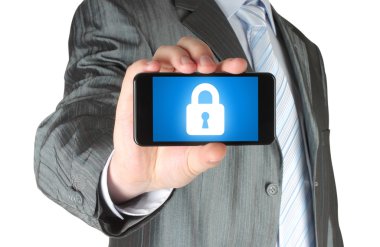 işadamı kapalı kilit ile akıllı telefon tutar