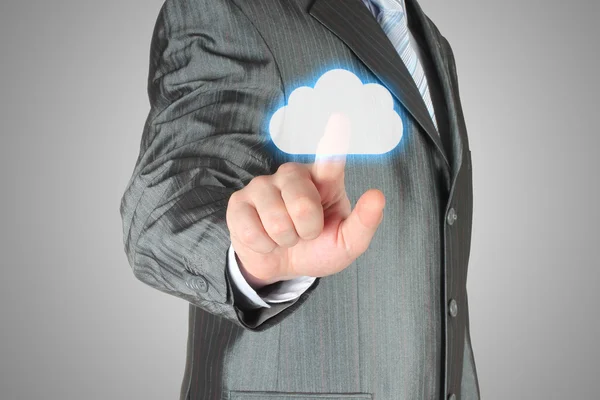 Бизнесмен нажимает кнопку виртуального облака — стоковое фото