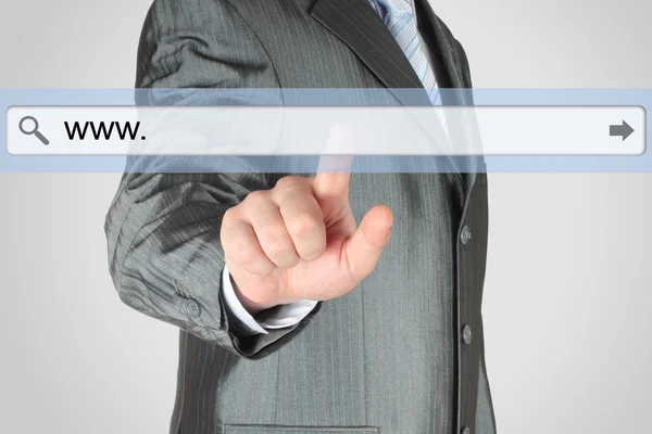 Businessman pushing virtual search bar — Stock Photo, Image