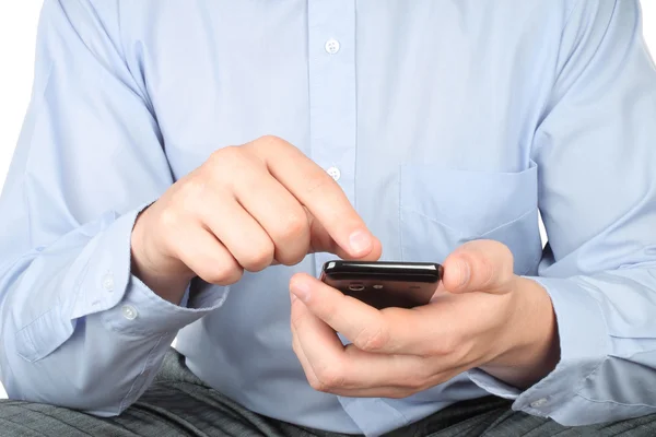 Biznesmen dotykając inteligentny telefon — Zdjęcie stockowe