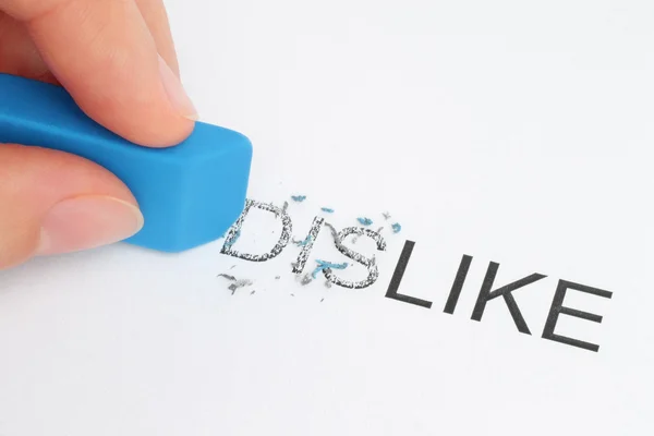 Hand erasing part of the dislike — Stock Photo, Image