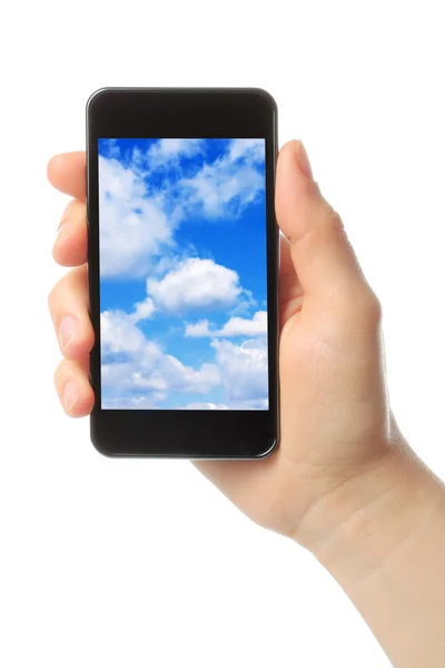 Donna mano tiene smart phone con cielo — Foto Stock