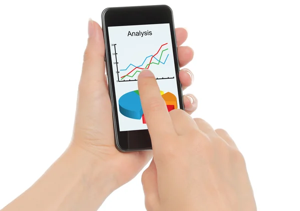 Händerna hålla smart telefon med grafer — Stockfoto