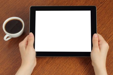 manos sostienen tablet pctablet pc el ele tutuşur