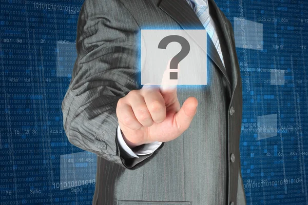 Businessman pushing virtual question button — Stock Photo, Image