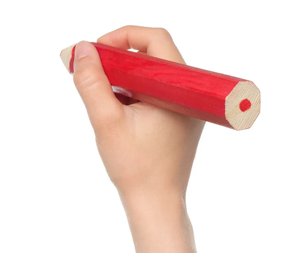 Nő kéz a nagy piros fa ceruza — Stock Fotó