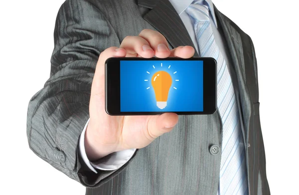 Man holds smart phone with idea concept — Stock Photo, Image