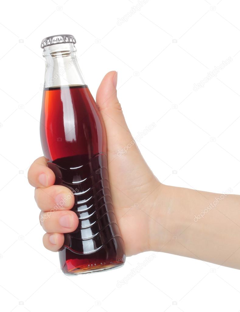 Hand with bottle of cola