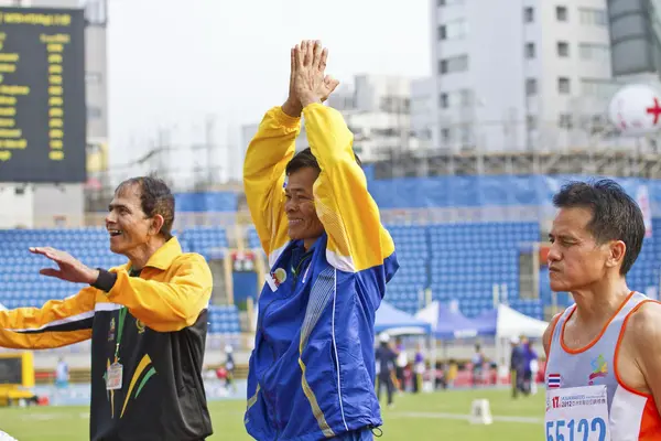 Elderly track and field game — Stock Photo, Image