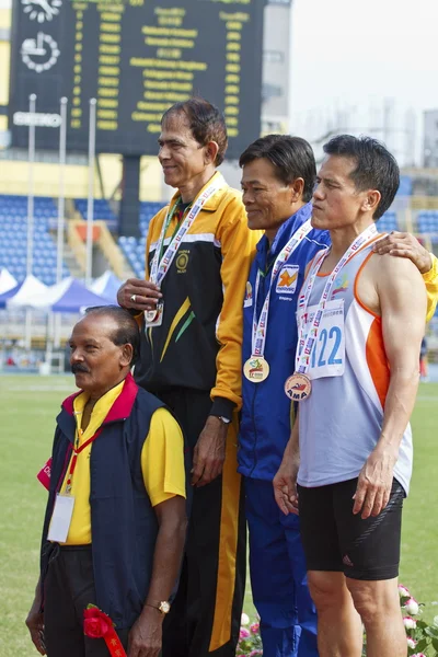 Elderly track and field game — Stock Photo, Image