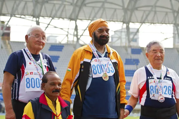 Elderly track and field game — Stock Photo, Image