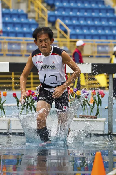 Pista de idosos e jogo de campo — Fotografia de Stock