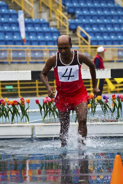 Pista de idosos e jogo de campo — Fotografia de Stock