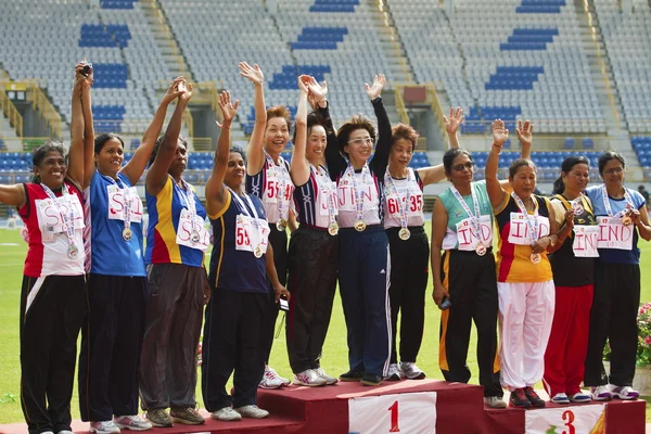 Elderly track and field game — Stock Photo, Image