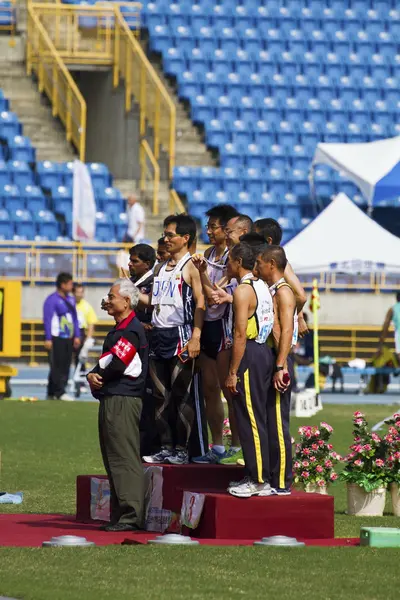 Elderly track and field game — Stock Photo, Image