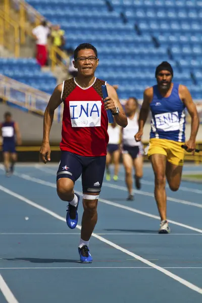 Elderly track and field game — Stock Photo, Image