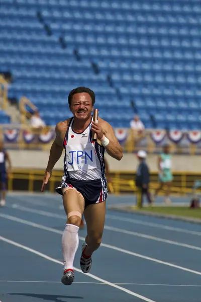 Elderly track and field game — Stock Photo, Image