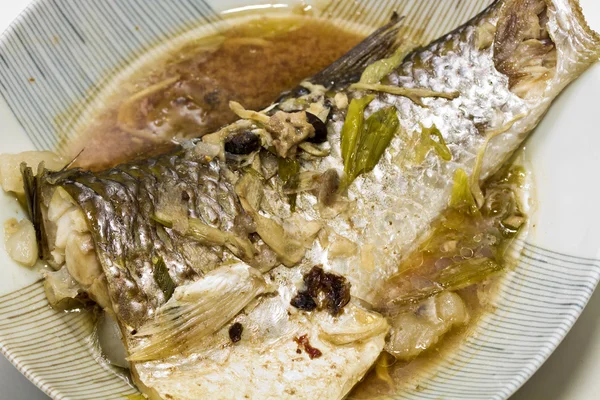 Fish in soy sauce — Stock Photo, Image