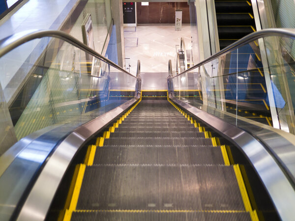 Empty escalator stairs