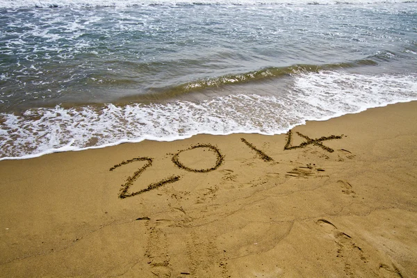 2014 jaar op strand — Stockfoto