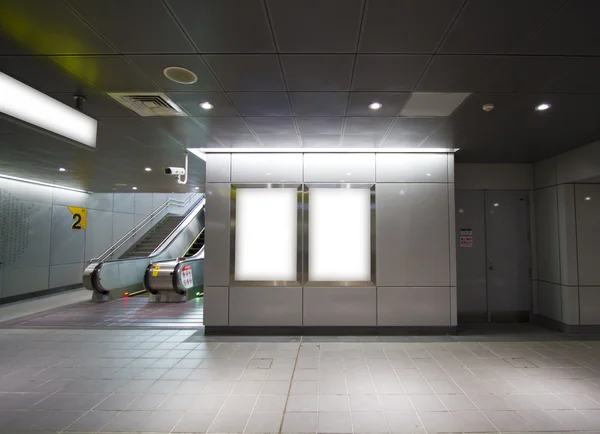 Blank billboard in metro station — Stock Photo, Image