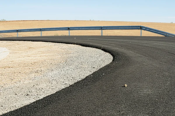 Nova estrada de asfalto — Fotografia de Stock