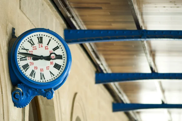 Antique external clock on railway station — Stock Photo, Image