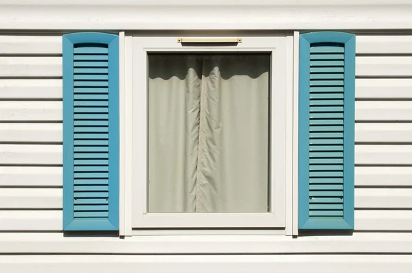 Window with wooden shutters — Stock Photo, Image