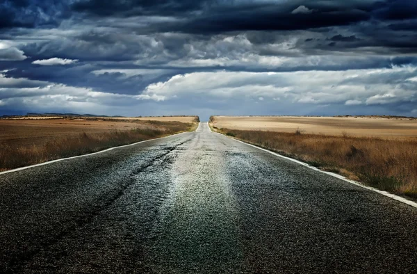 Old dramatic asphalt road — Stock Photo, Image