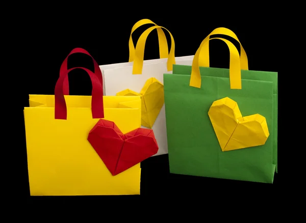 Shopping bags with heart. Isolated origami — Stock Photo, Image