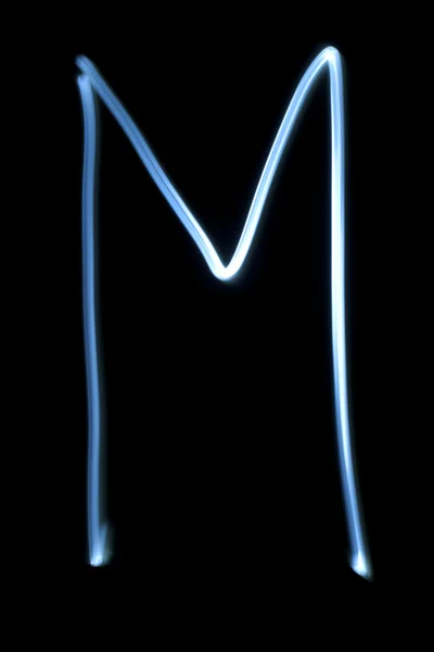 Den bokstav m från neon ljus. — Stockfoto