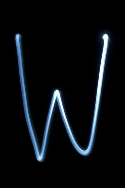 The letter W from neon light. — Stock Photo, Image