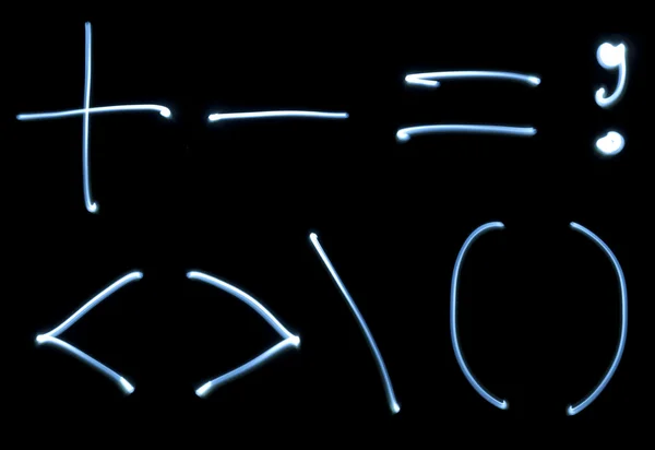 Mathematische Zeichen aus Neonlicht gesetzt — Stockfoto