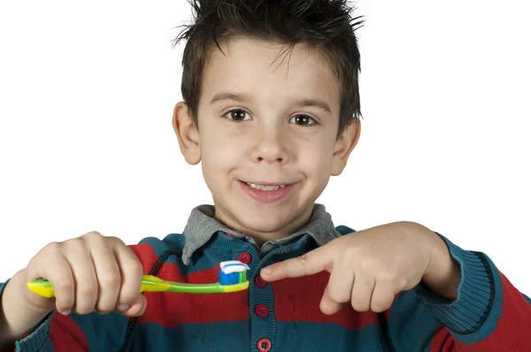 Хлопчик чистить зуби — стокове фото