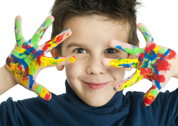 Boy hands painted with colorful paint