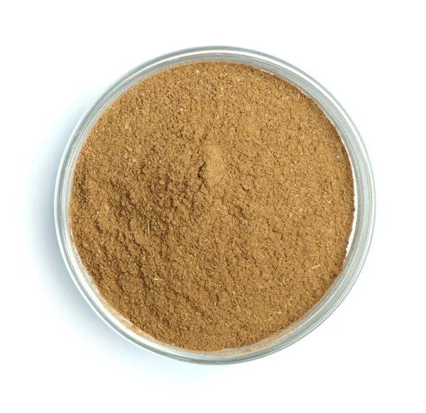 Powdered cinnamon in bowl — Stock Photo, Image