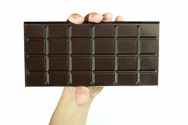 Hand holding chocolate bar — Stock Photo, Image