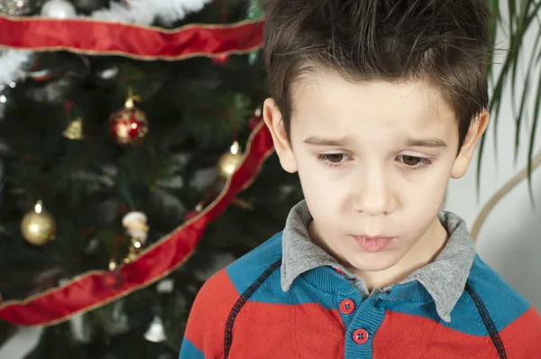 Menino infeliz em christmass — Fotografia de Stock