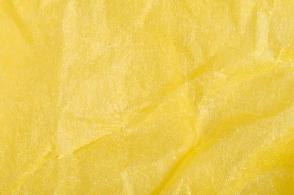 Papel amarelo amassado — Fotografia de Stock