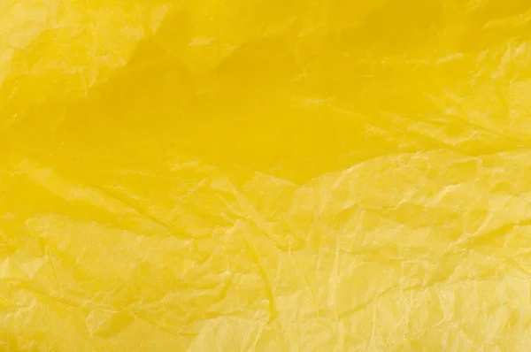Papel amarelo amassado — Fotografia de Stock