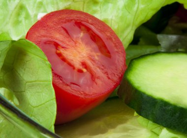 Salad in a glass bowl close up.