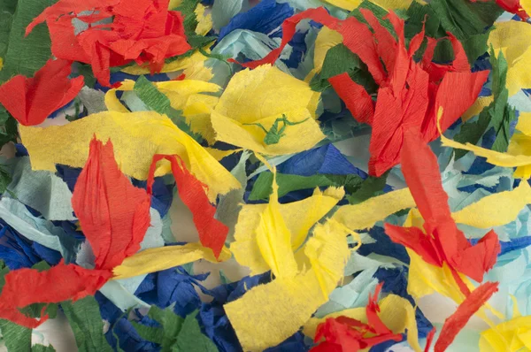 Many colorful pieces of torn paper — Stock Photo, Image
