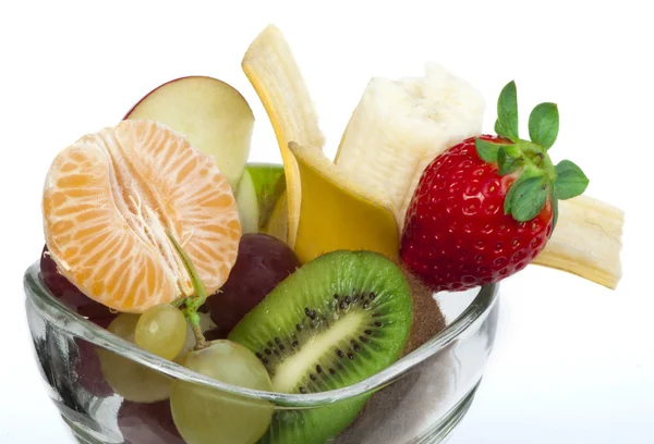 Fruit salad in a glass bowl — Stock Photo, Image