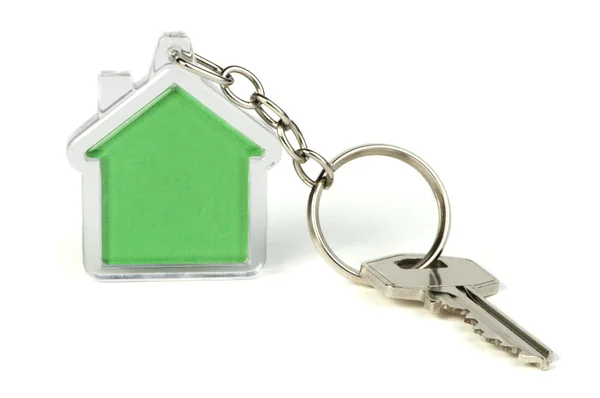 Sleutelhanger met figuur van groen huis — Stockfoto