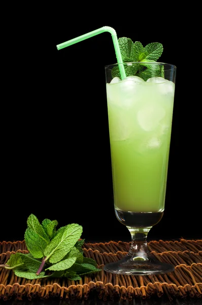 Green cocktail with cubes ice — Stock Photo, Image